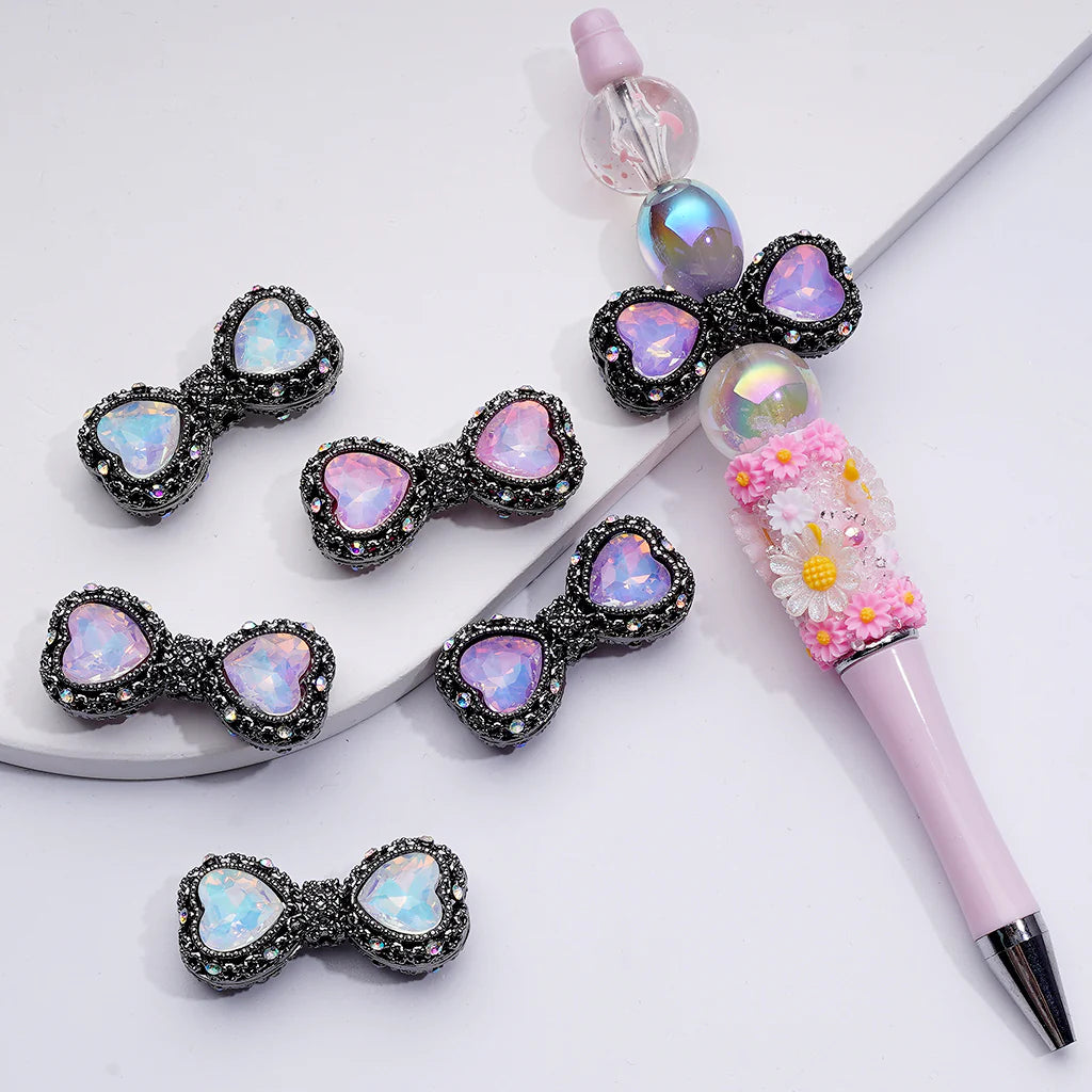 z-Gun Black Metal Beads Bowtie Shape with Hollow Alloy Acrylic Heart Rhinestones, 34MM by 17MM